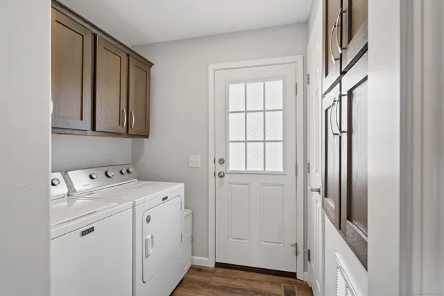 a view of storage and utility room with washer and dryer