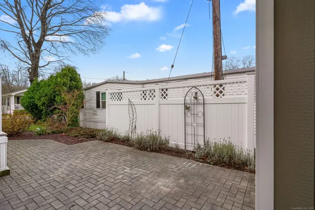 a front view of a building with pathway