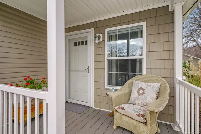 a view of a porch with furniture