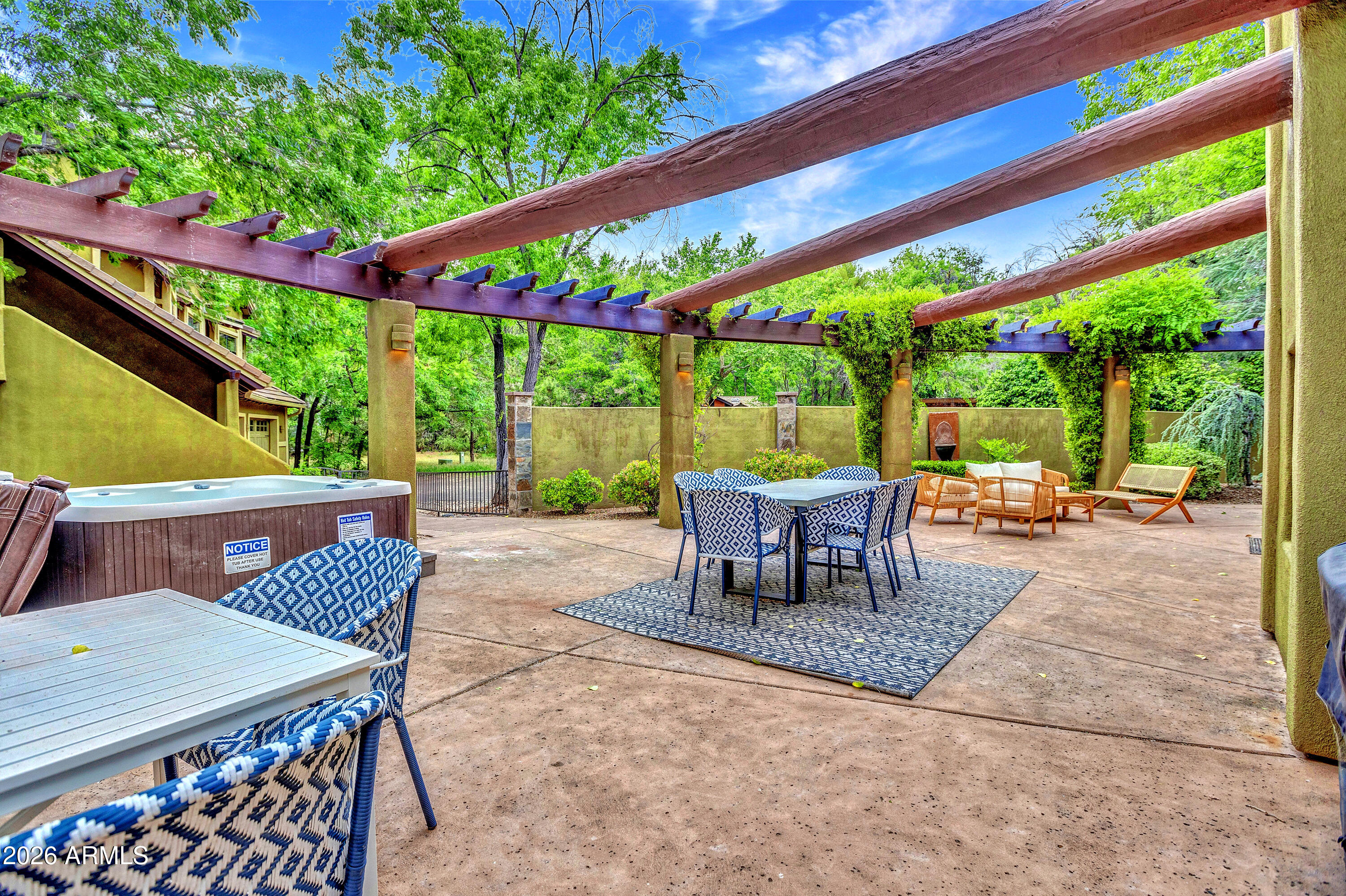 55 Ranch House Circle Sedona, AZ 86336 - Photo 55 of 61 a patio view with a table and chairs