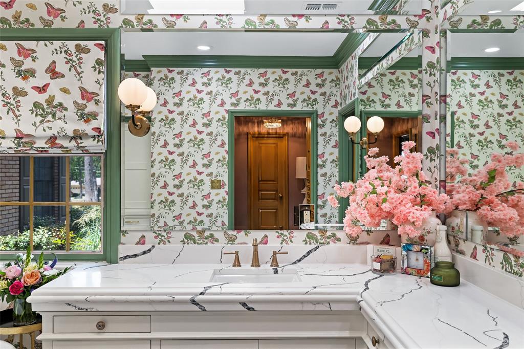 924 Kintner Drive Graham, TX 76450 - Photo 16 of 40 a bathroom with a sink mirror and vanity