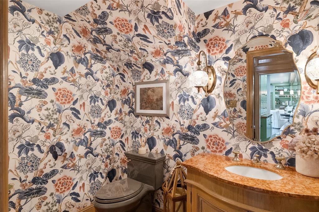 924 Kintner Drive Graham, TX 76450 - Photo 28 of 40 a bathroom with a sink and a mirror