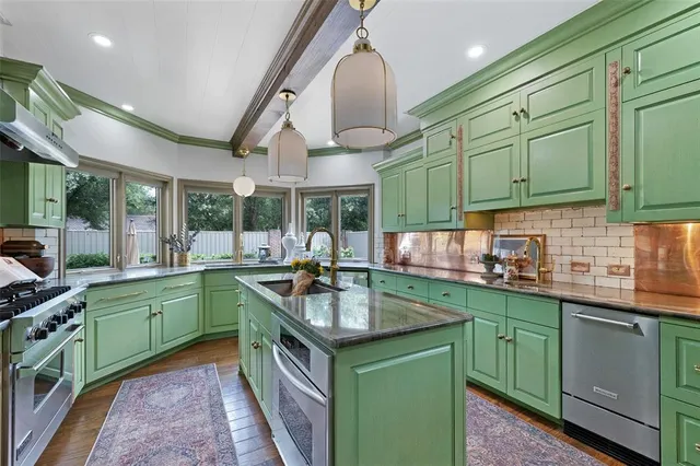 a kitchen with lots of counter space and a sink