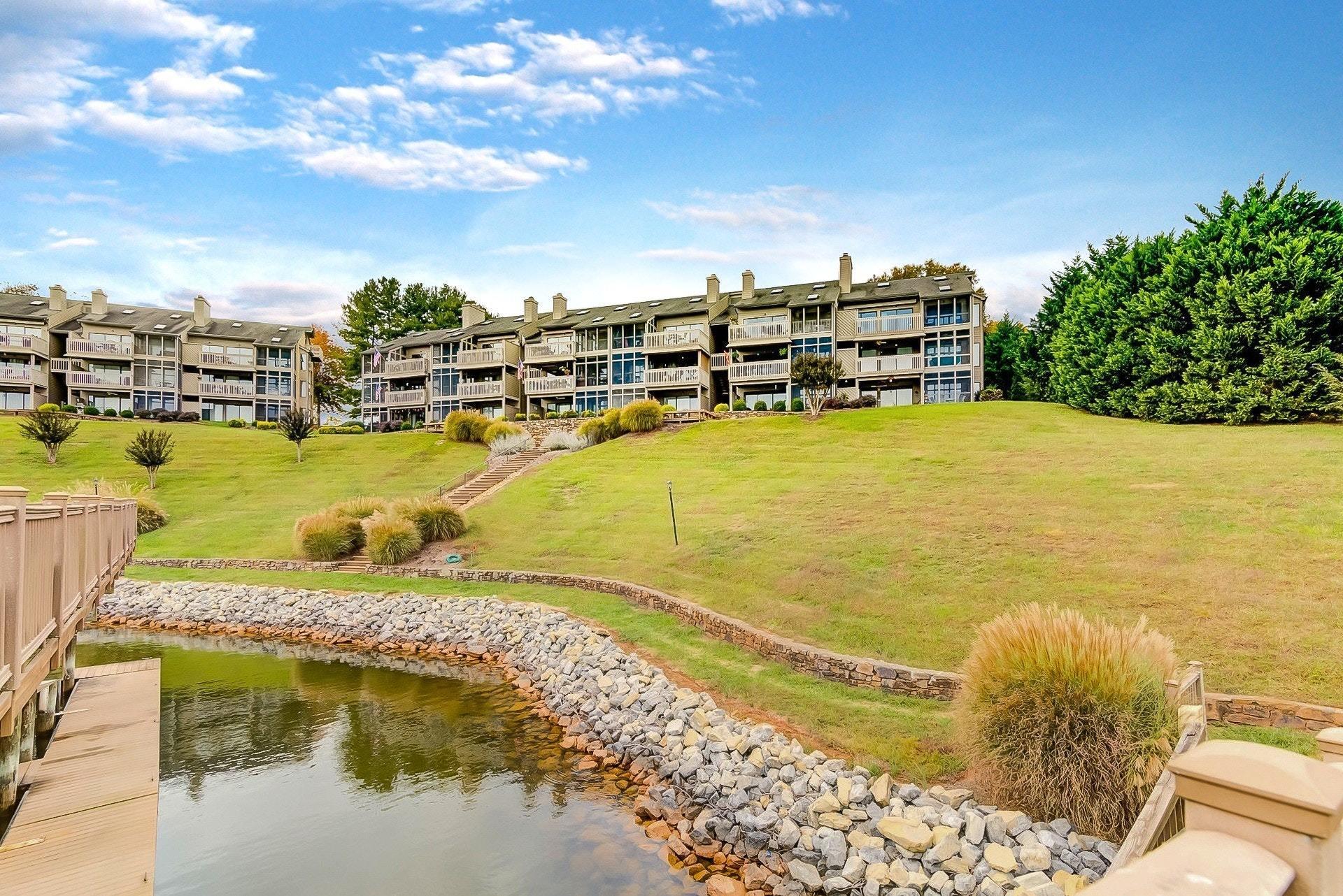 835 Gangplank Road, Unit 103 Moneta, VA 24121 - Photo 2 of 34 a view of a swimming pool with an ocean view