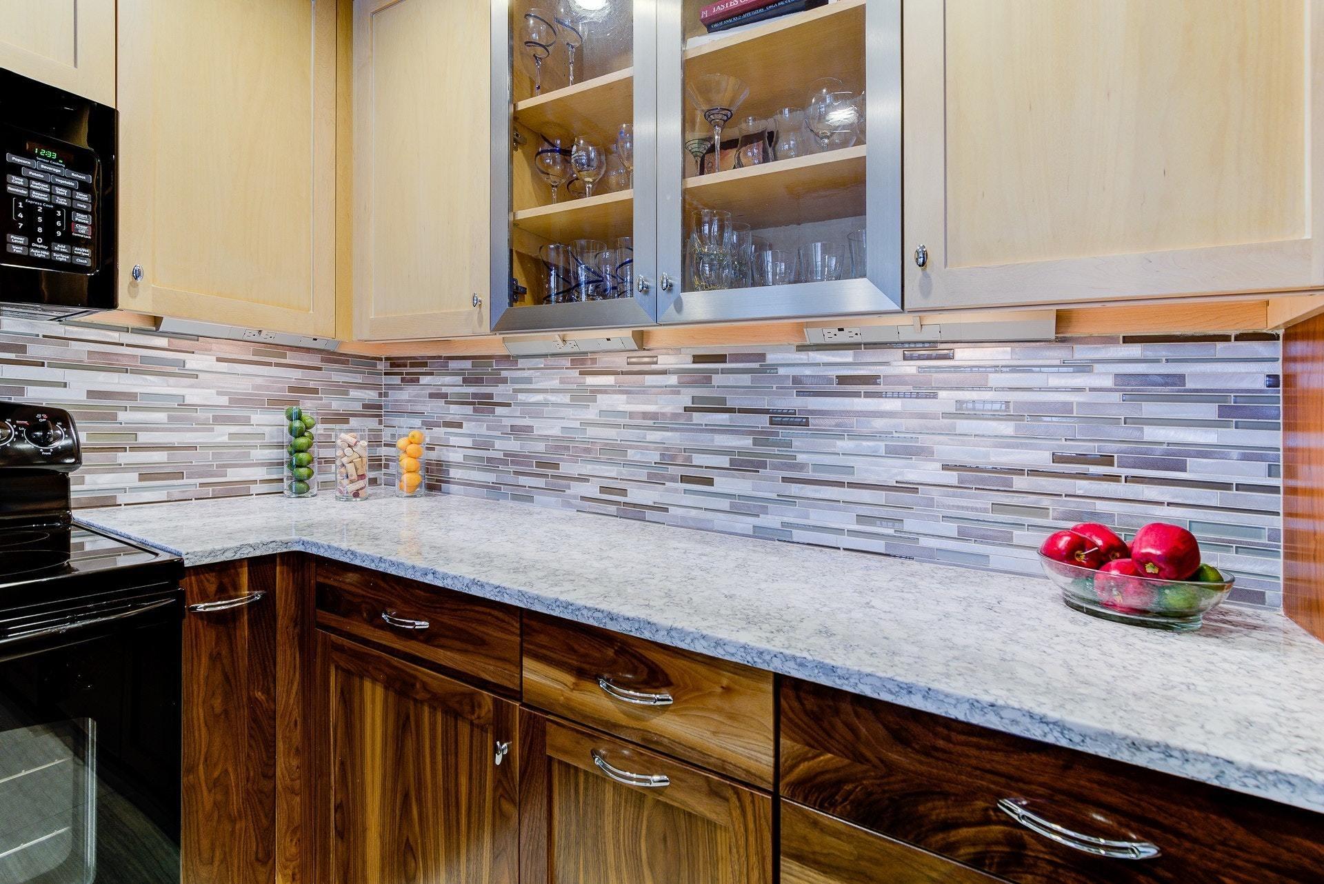 835 Gangplank Road, Unit 103 Moneta, VA 24121 - Photo 16 of 34 a kitchen with granite countertop a sink and cabinets