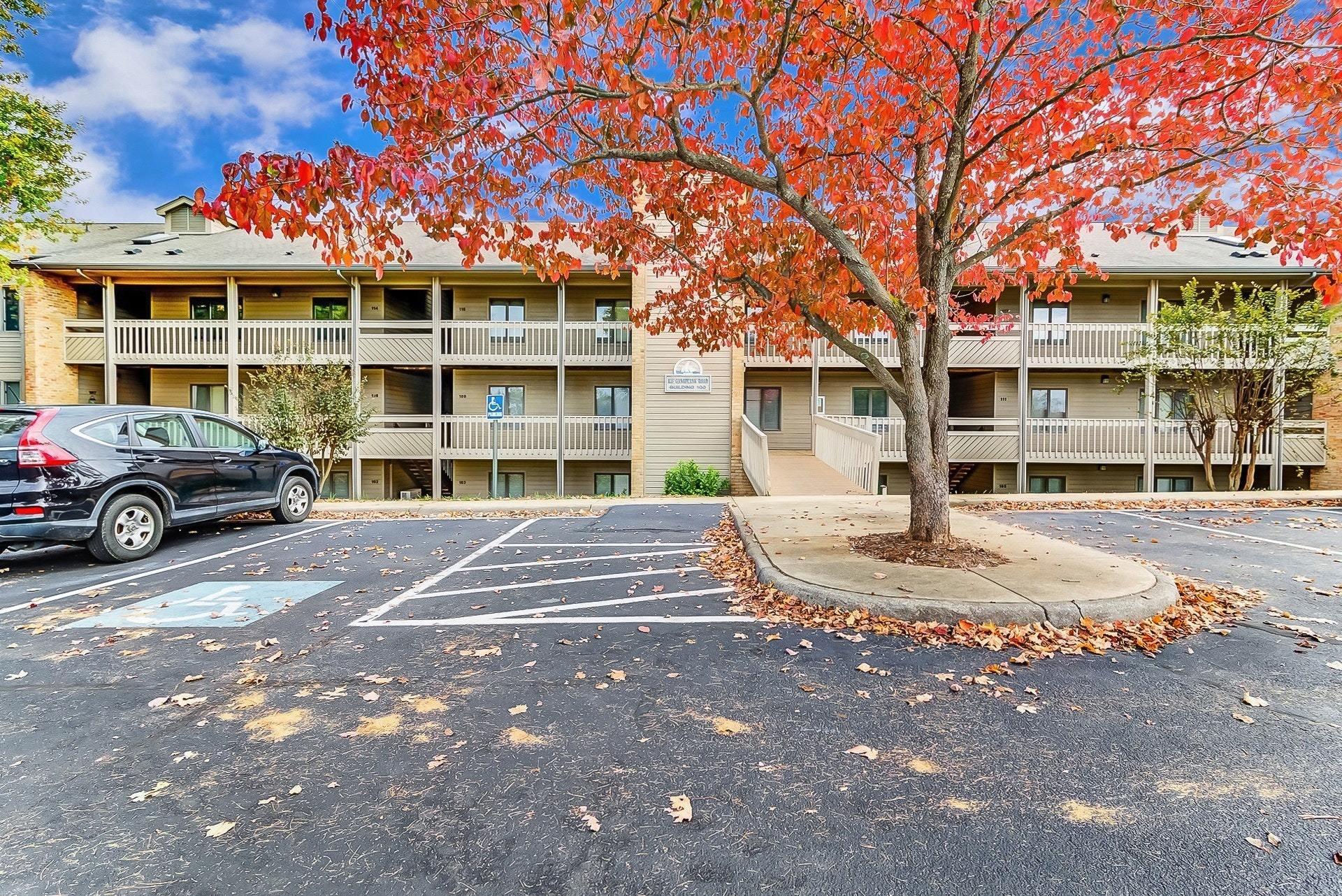 835 Gangplank Road, Unit 103 Moneta, VA 24121 - Photo 3 of 34 a front view of a building with a garden