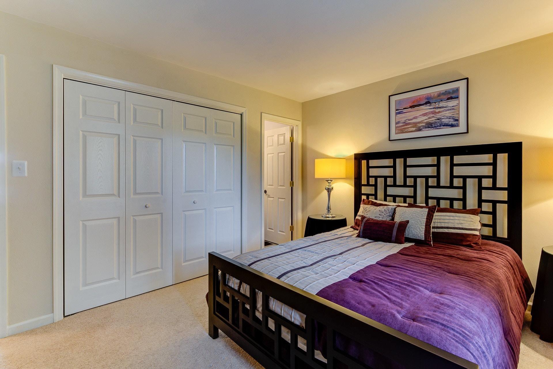 835 Gangplank Road, Unit 103 Moneta, VA 24121 - Photo 22 of 34 a bed room with a bed and a table