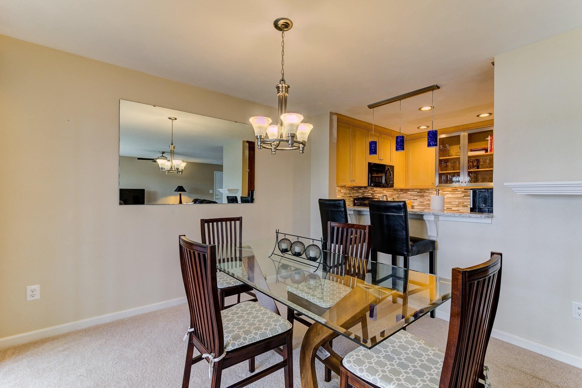 835 Gangplank Road, Unit 103 Moneta, VA 24121 - Photo 10 of 34 a dining room with furniture and window