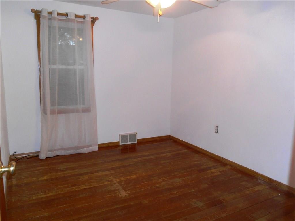 5990 Library Road Bethel Park, PA 15102 - Photo 20 of 24 Bedroom # 3 with hardwood floors.