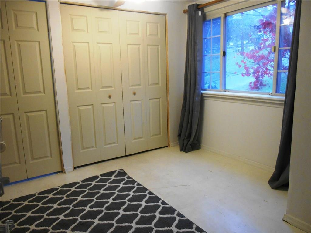 5990 Library Road Bethel Park, PA 15102 - Photo 21 of 24 Bedroom four was used has a full walk in closet!! The washer and dryer are hidden in the closet.