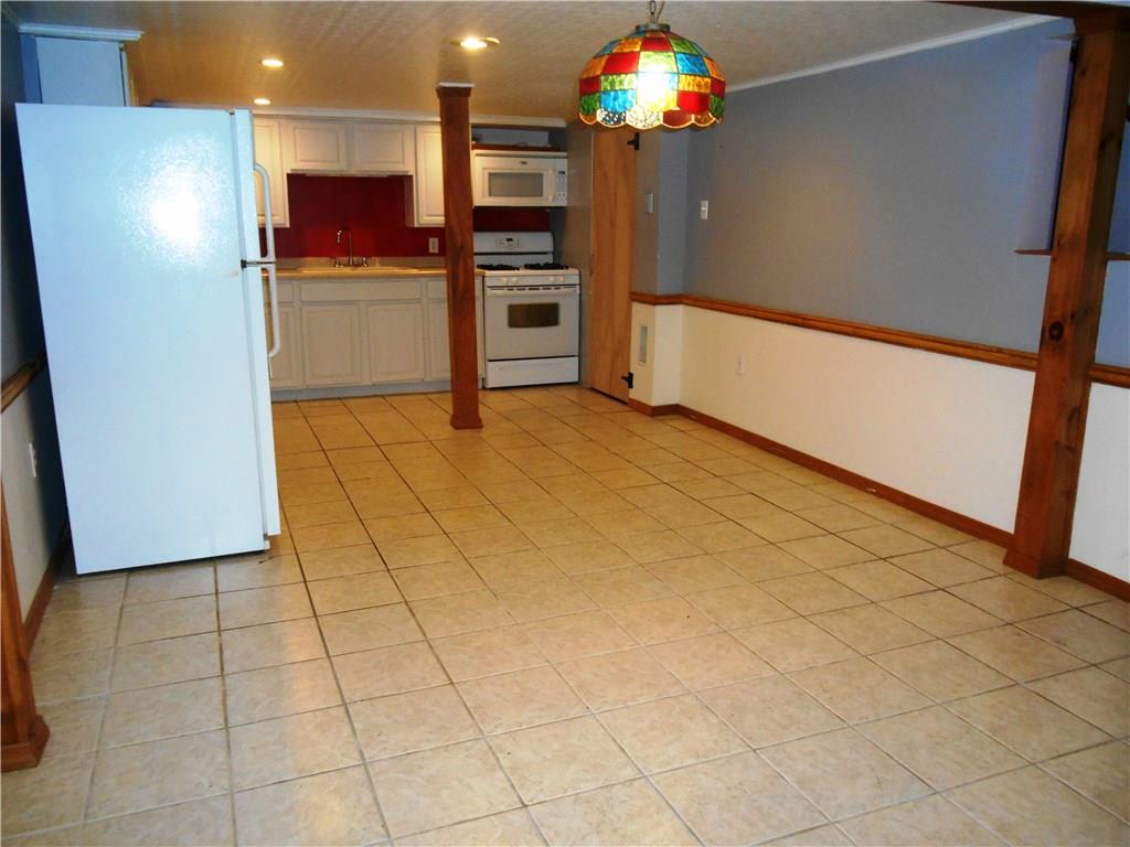 5990 Library Road Bethel Park, PA 15102 - Photo 4 of 24 LARGE eat in kitchen with extra storage BEHIND the cabinets!