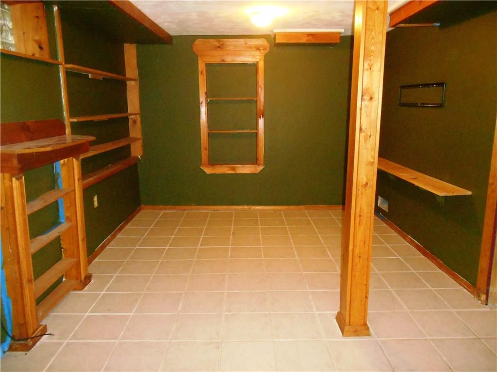 5990 Library Road Bethel Park, PA 15102 - Photo 9 of 24 Formally used as a "man cave." Beautiful woodwork throughout!