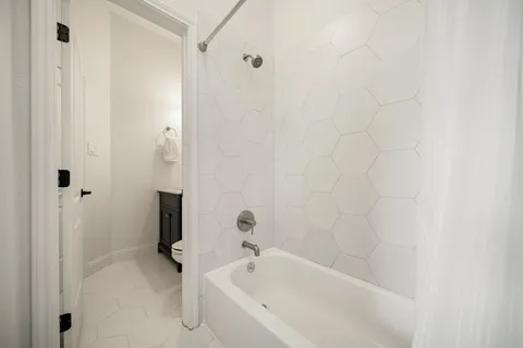 a bathroom with a bathtub