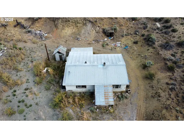 a upper view of a house with a yard