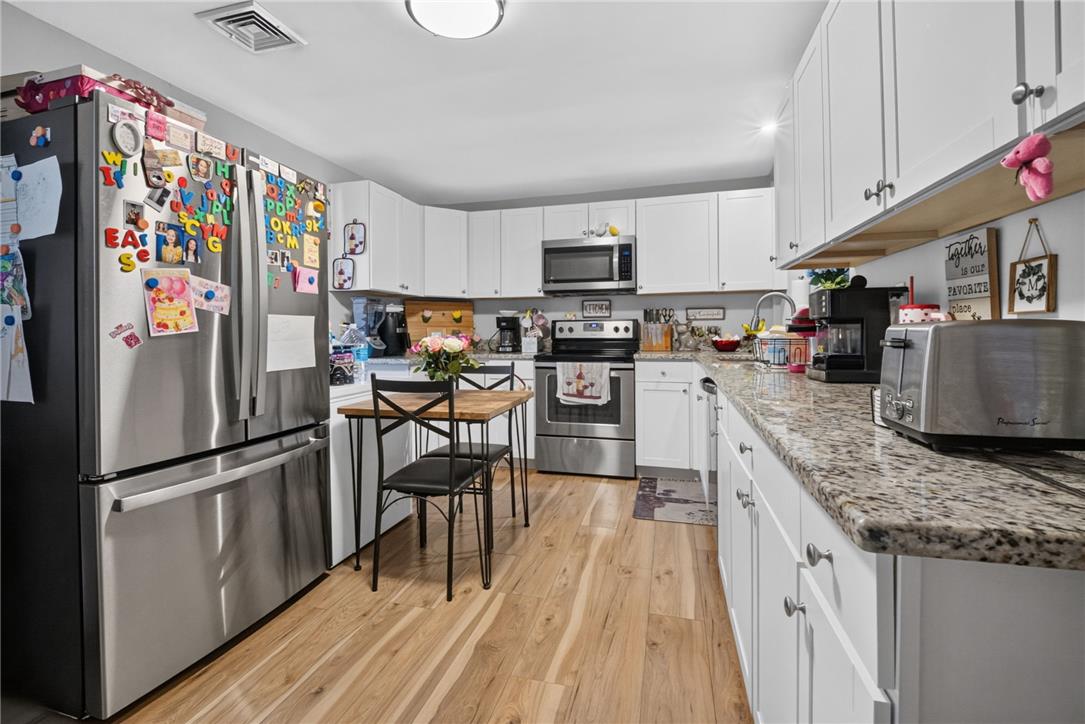 3123 Orefield Road Allentown, PA 18104 - Photo 18 of 39 A well-appointed culinary space featuring gleaming stainless steel appliances and abundant counter space.