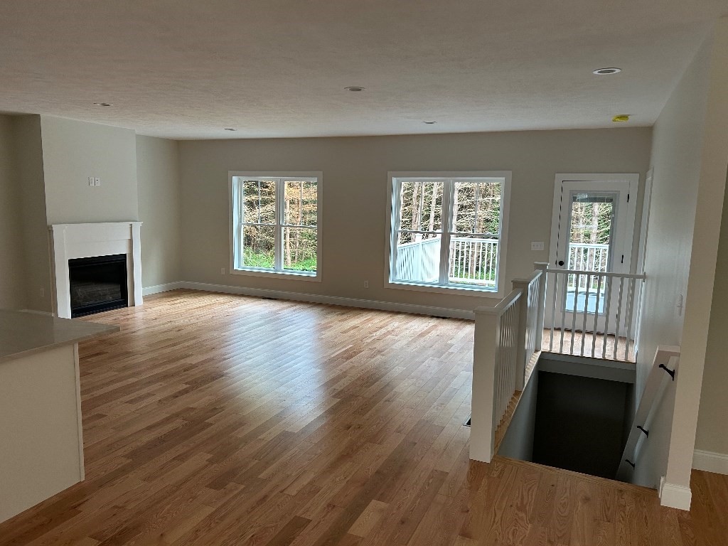 190 Whitins Road Sutton, MA 01590 - Photo 13 of 15 a view of a livingroom with furniture and a fireplace