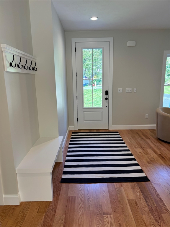 190 Whitins Road Sutton, MA 01590 - Photo 5 of 15 a view of a room with wooden floor and windows