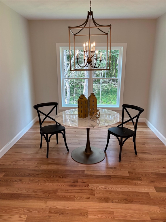 190 Whitins Road Sutton, MA 01590 - Photo 7 of 15 a view of a dining room with furniture window and outside view