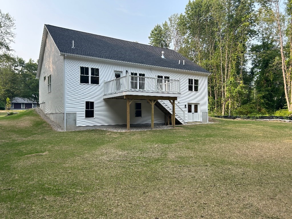 190 Whitins Road Sutton, MA 01590 - Photo 8 of 15 a view of a house with a yard
