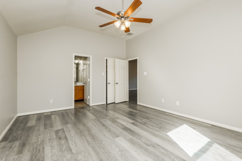 11747 Elizabeth Court Pinehurst, TX 77362 - Photo 10 of 16 a view of an empty room with a window