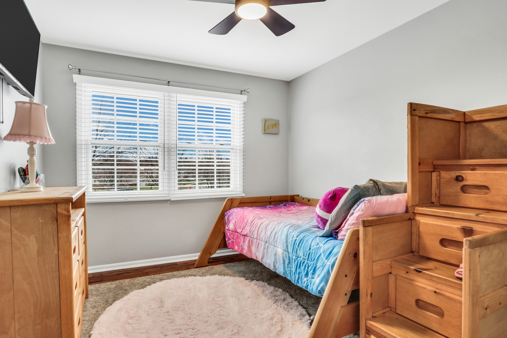 4049 Ridge Road Zion, IL 60099 - Photo 17 of 28 a bedroom with a bed and a window