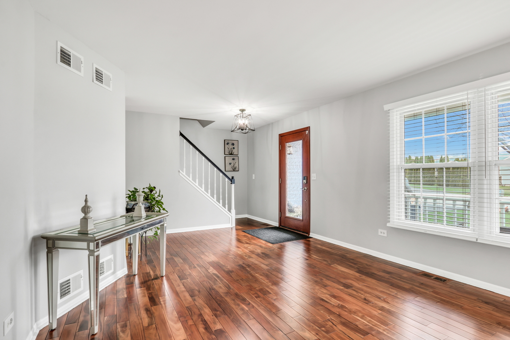 4049 Ridge Road Zion, IL 60099 - Photo 2 of 28 a view of an entryway with wooden floor