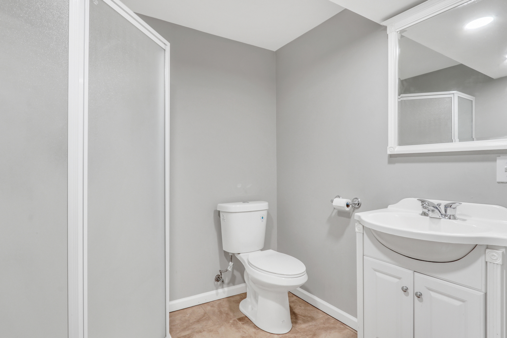 4049 Ridge Road Zion, IL 60099 - Photo 25 of 28 a bathroom with a sink toilet and a mirror