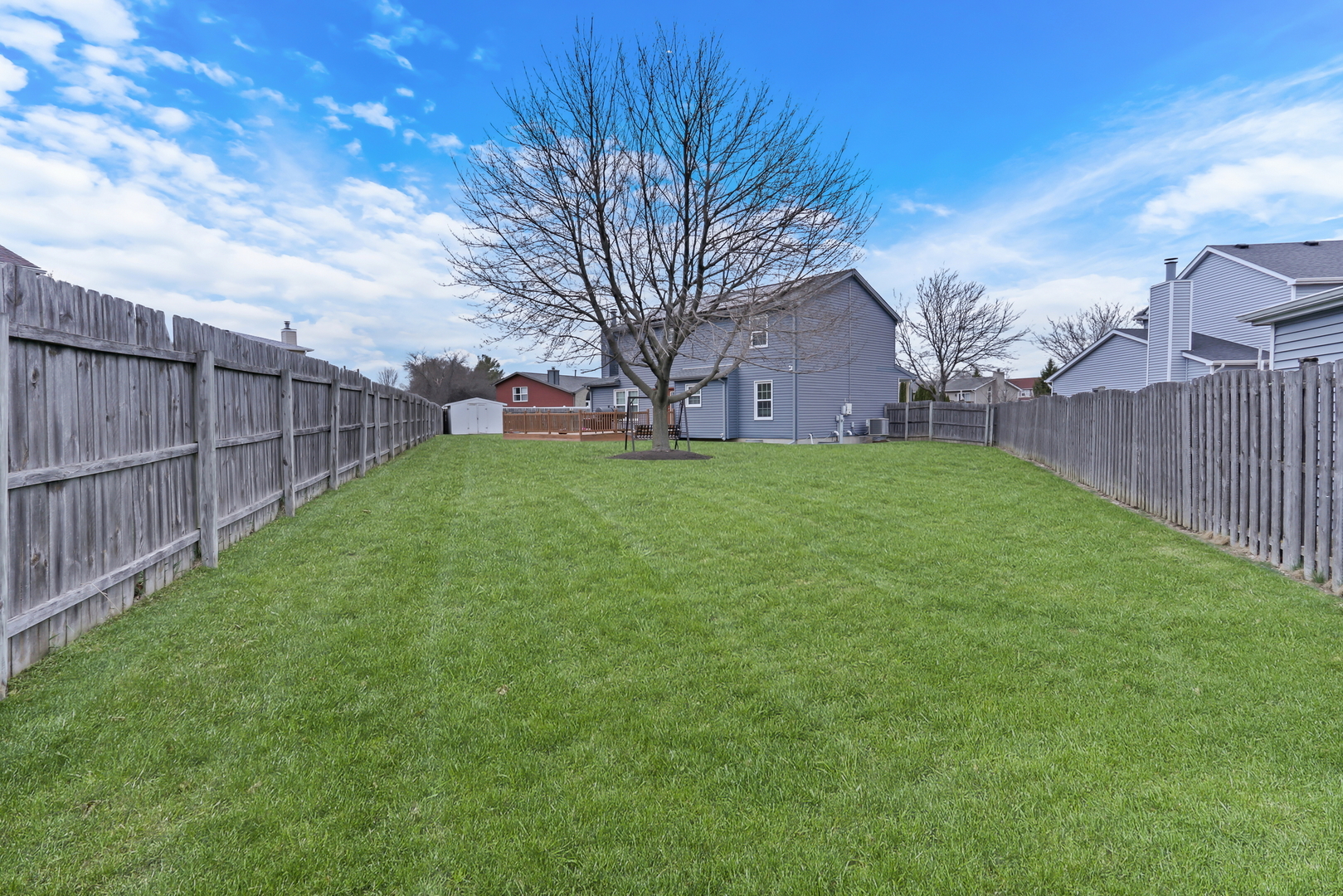 4049 Ridge Road Zion, IL 60099 - Photo 27 of 28 a view of a backyard with a large tree