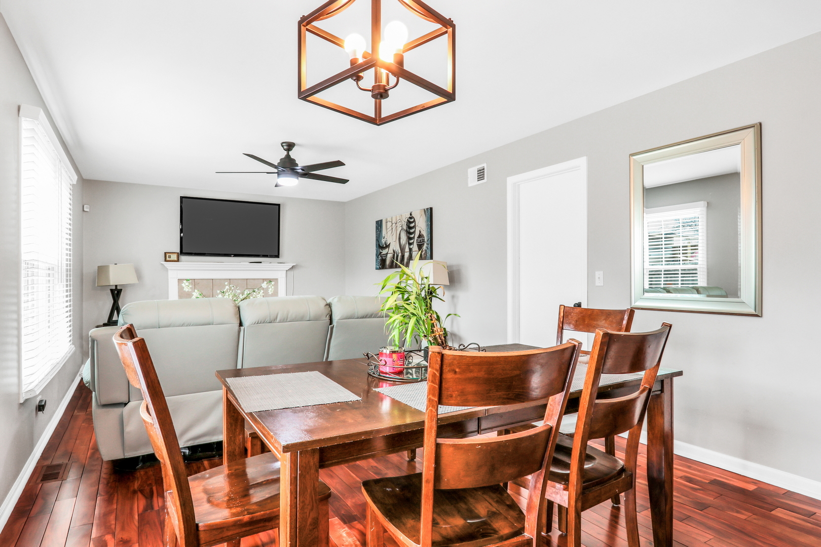 4049 Ridge Road Zion, IL 60099 - Photo 10 of 28 a view of a dining room with furniture and wooden floor