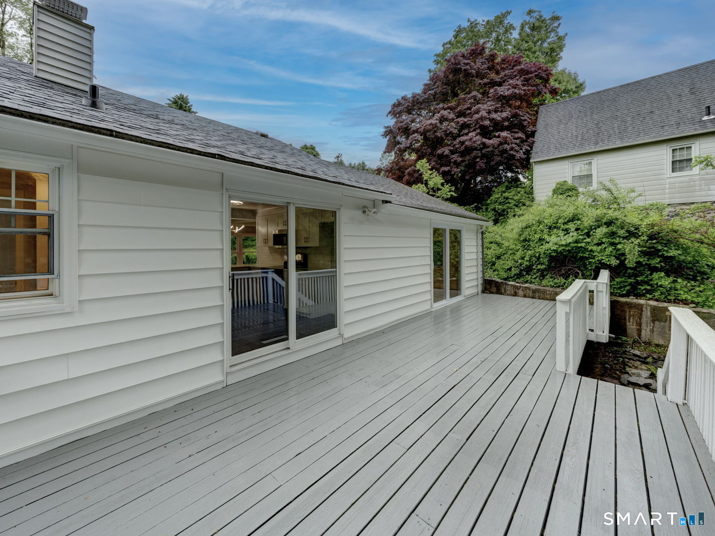 11 Cheshire Road Prospect, CT 06712 - Photo 29 of 38 a view of backyard with a deck and wooden floor