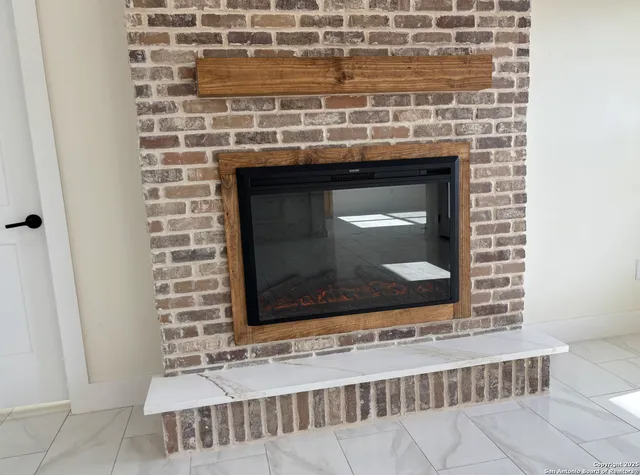 a fireplace with a clock