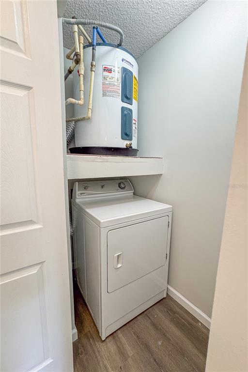5436 East Michigan Street, Unit 4 Orlando, FL 32812 - Photo 19 of 37 a utility room with dryer and washer