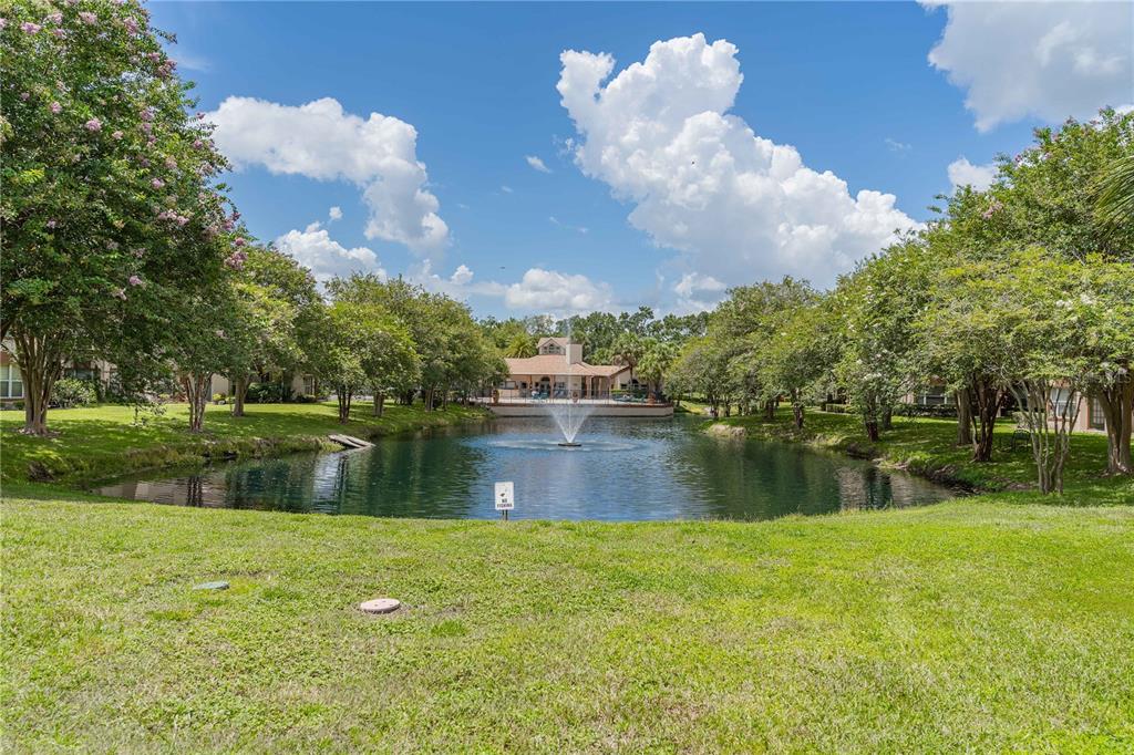 5436 East Michigan Street, Unit 4 Orlando, FL 32812 - Photo 31 of 37 a view of lake with green space