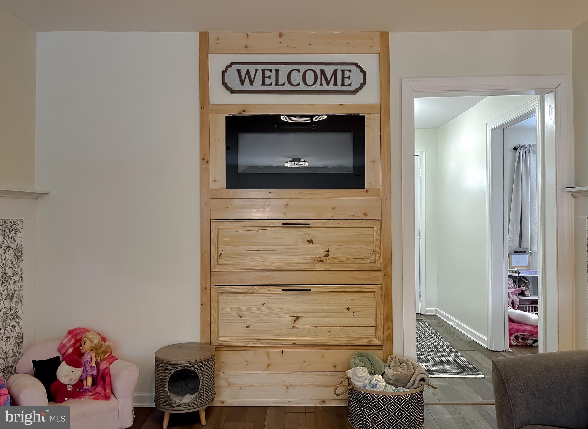 17262 Larimer Street Piney Point, MD 20674 - Photo 14 of 44 a hallway with a stove and a microwave