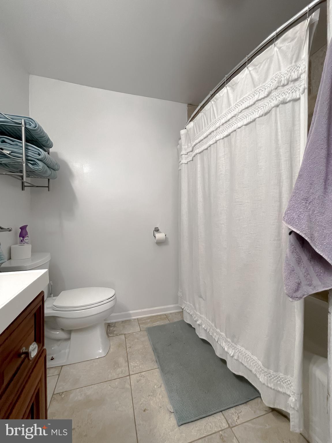 17262 Larimer Street Piney Point, MD 20674 - Photo 21 of 44 a bathroom with a toilet and shower