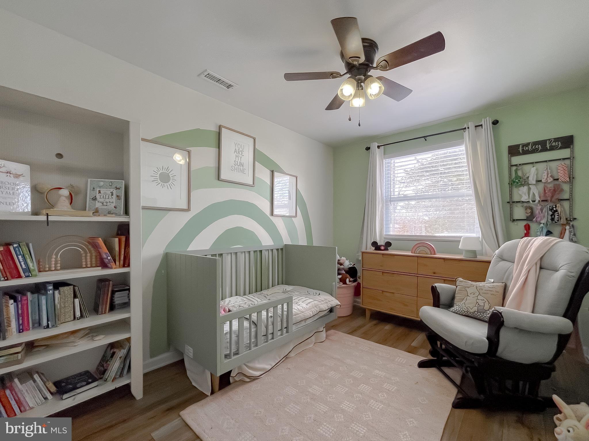 17262 Larimer Street Piney Point, MD 20674 - Photo 23 of 44 a bedroom with furniture a bed and a book shelf