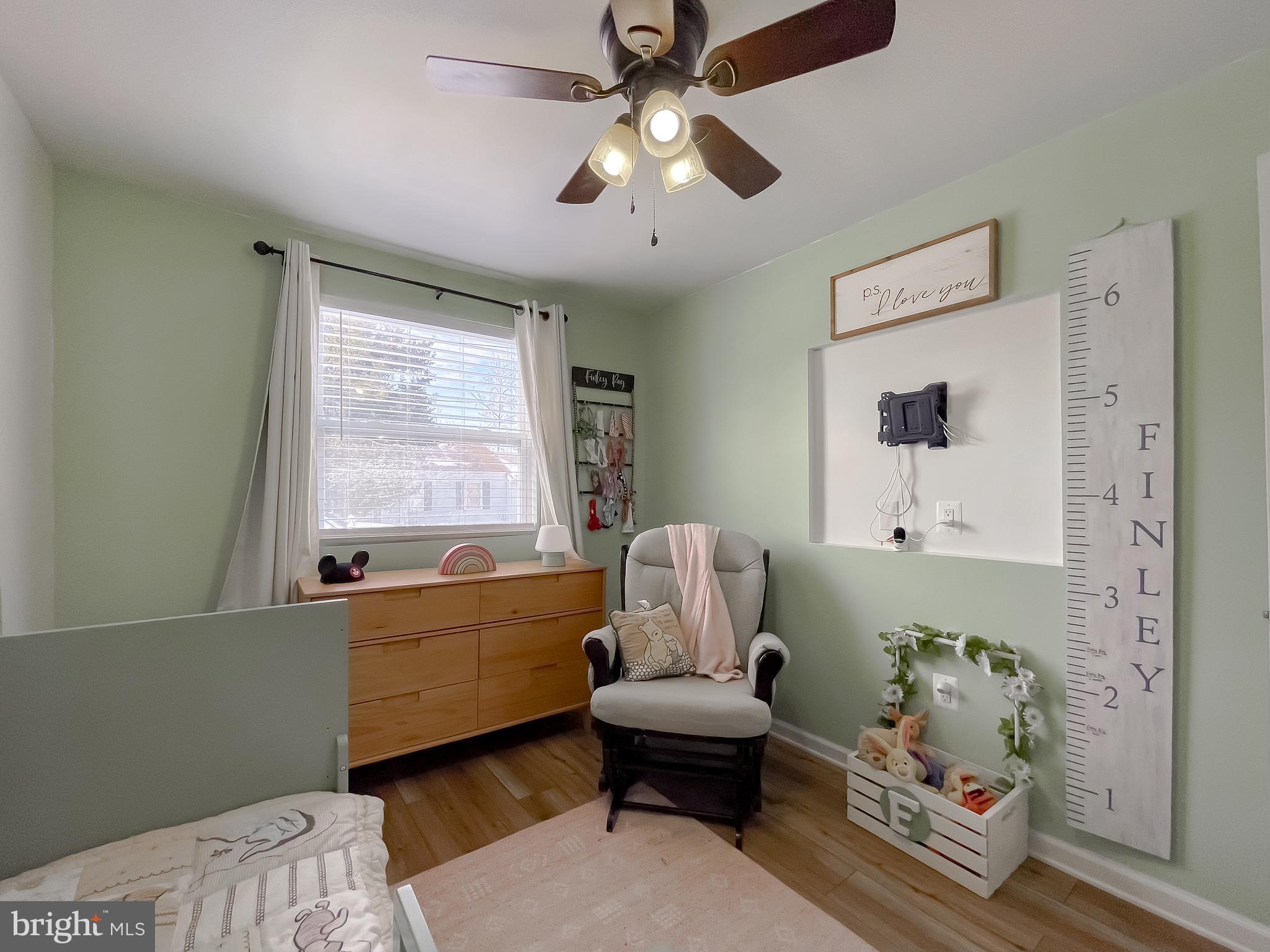 17262 Larimer Street Piney Point, MD 20674 - Photo 24 of 44 a living room with furniture and a large window