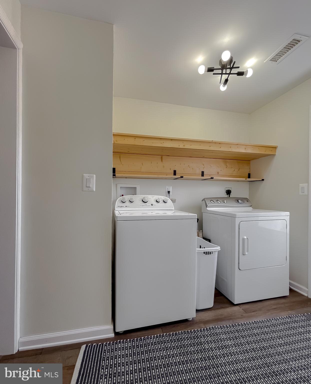 17262 Larimer Street Piney Point, MD 20674 - Photo 32 of 44 a utility room with dryer and washer