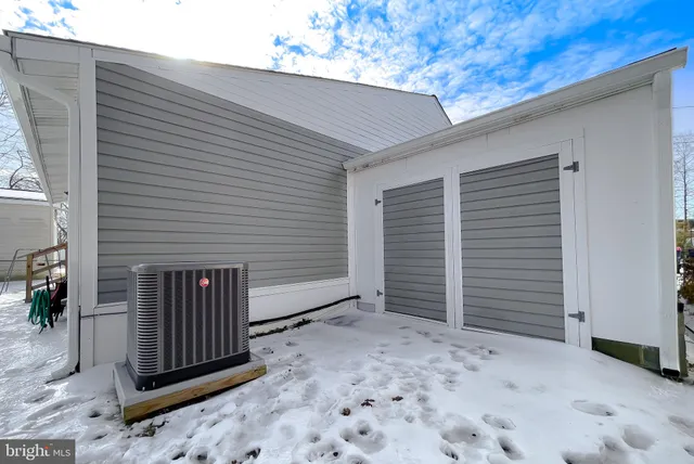 a front view of a house with a garage