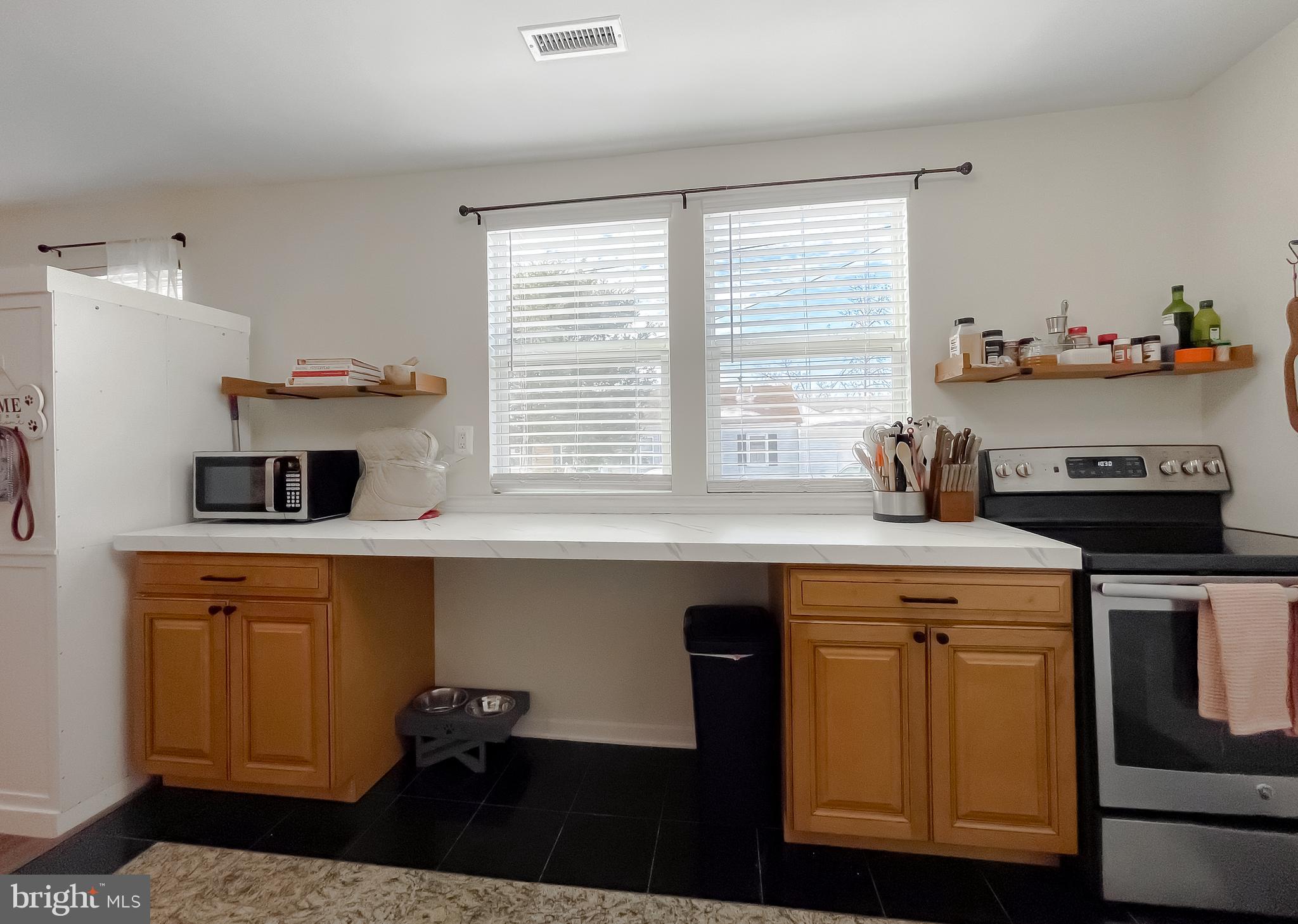 17262 Larimer Street Piney Point, MD 20674 - Photo 10 of 44 a kitchen with a sink cabinets and window