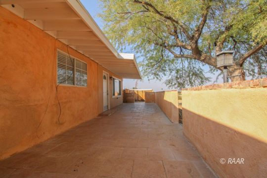 1645 Porter Street Ridgecrest, CA 93555 - Photo 2 of 35 a view of a balcony with trees