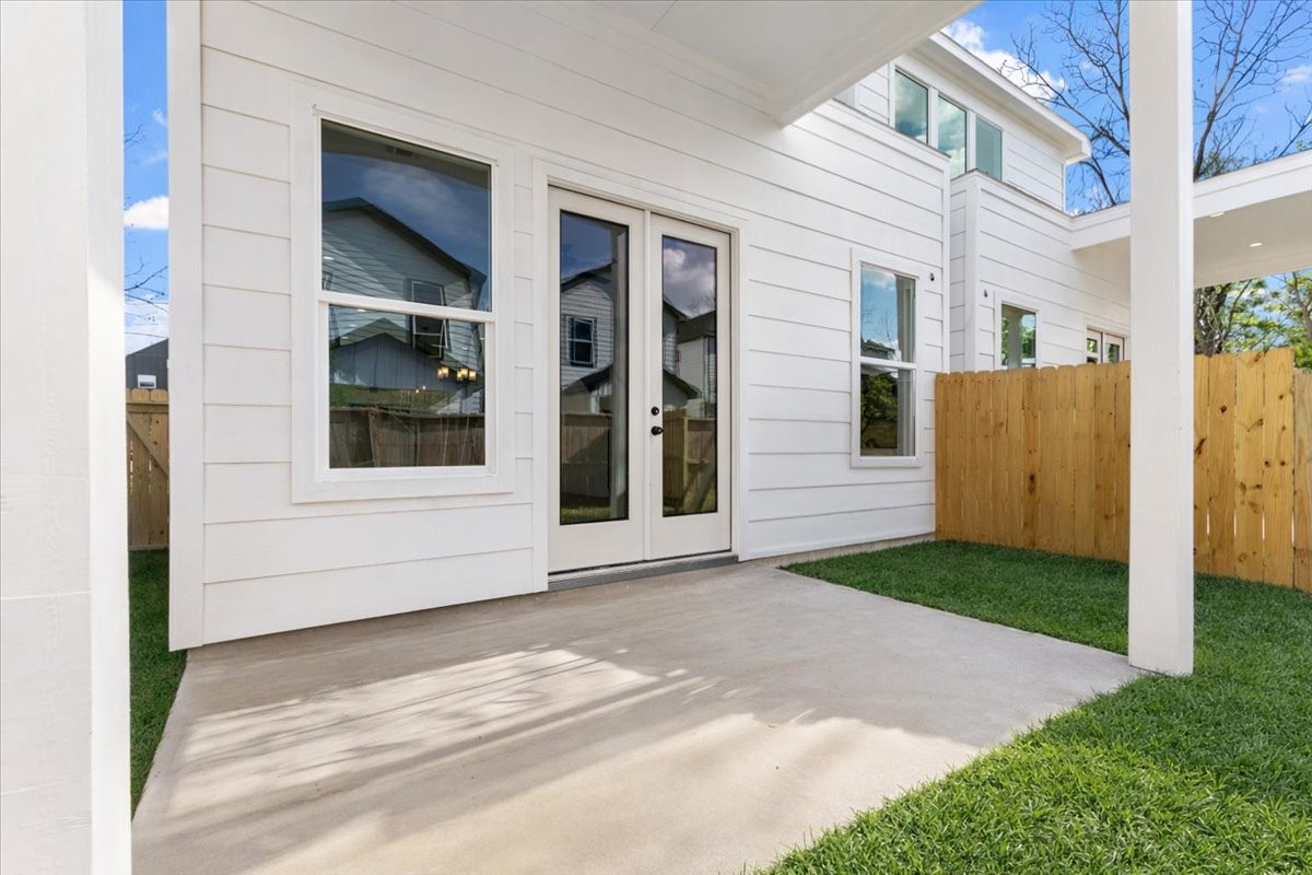 311 Tennessee Street Houston, TX 77029 - Photo 38 of 38 a view of house with backyard and glass windows