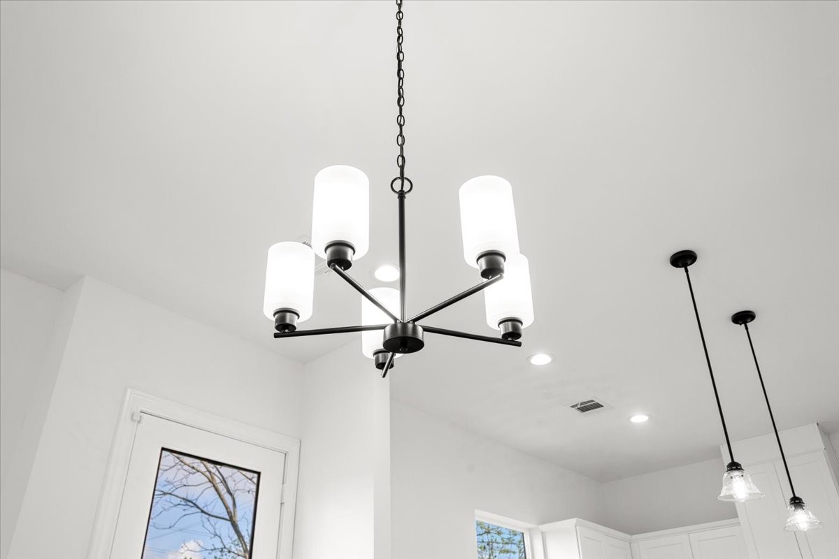 311 Tennessee Street Houston, TX 77029 - Photo 6 of 38 a room with a window and a ceiling fan