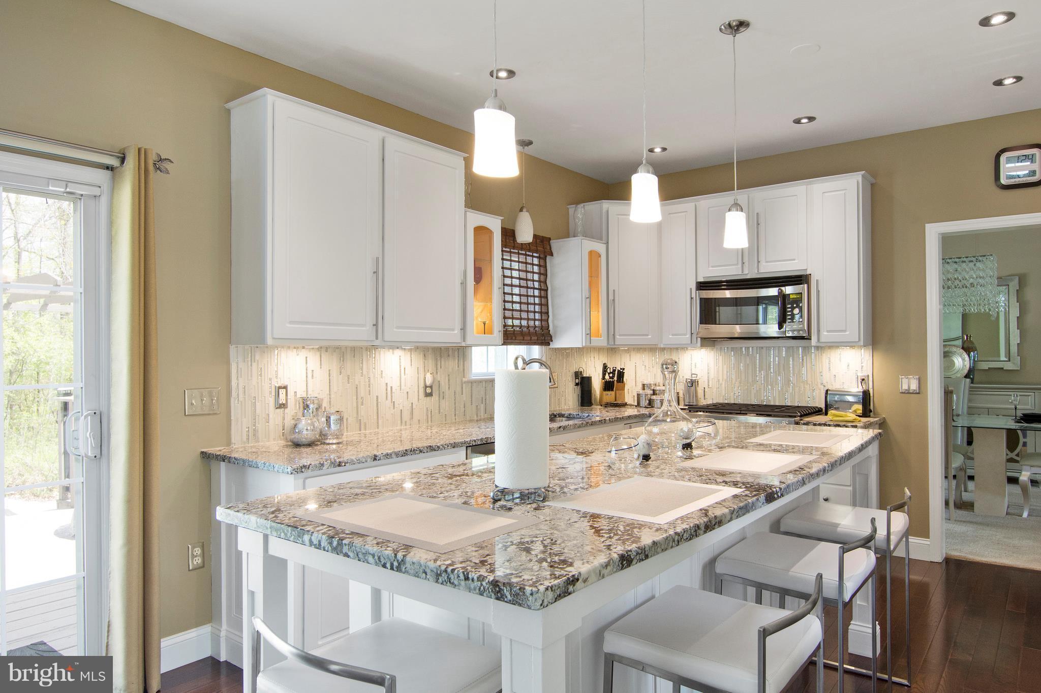 8495 Lucerne Road Randallstown, MD 21133 - Photo 13 of 30 8 ft granite topped kitchen island
