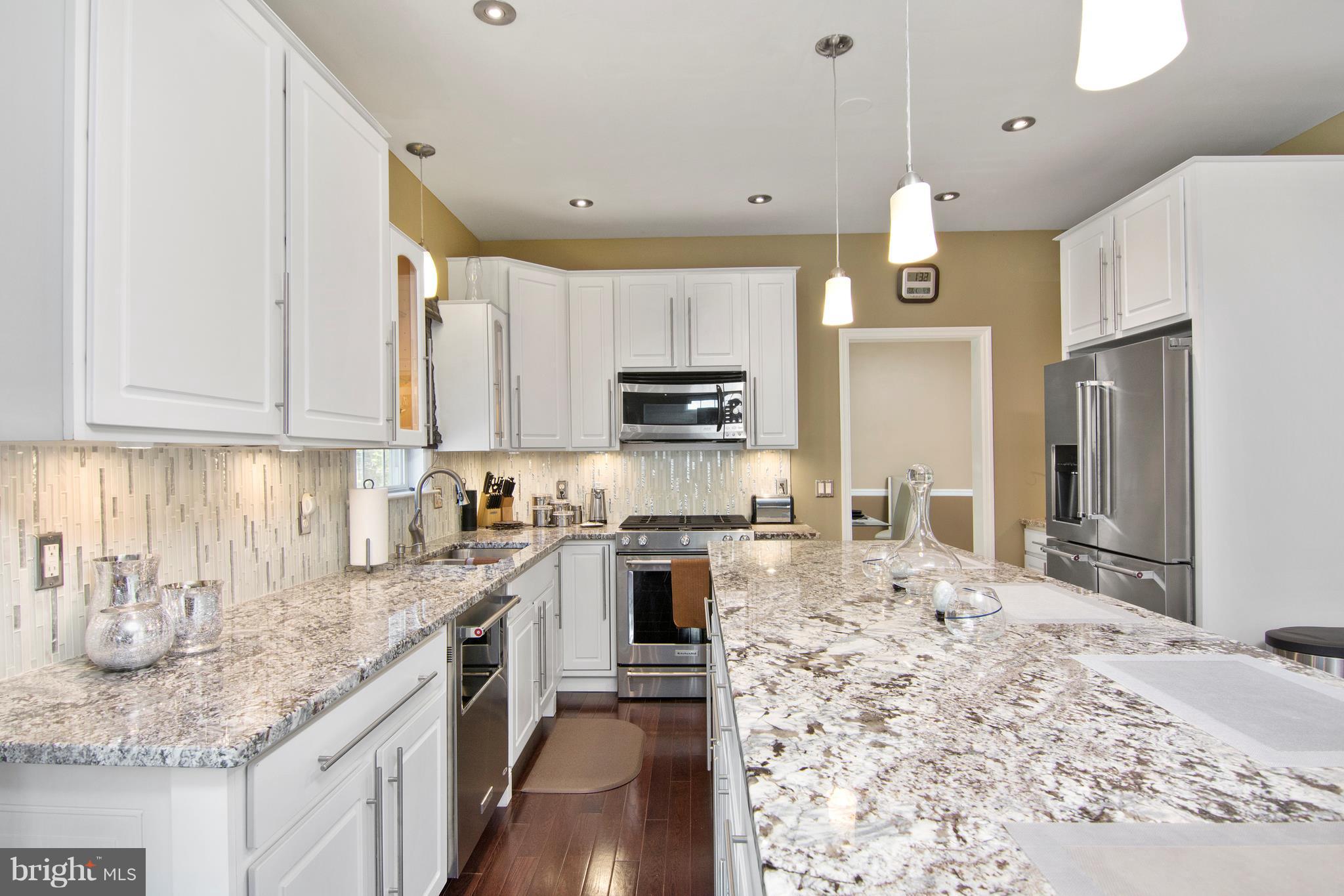 8495 Lucerne Road Randallstown, MD 21133 - Photo 15 of 30 Glass tile backsplash