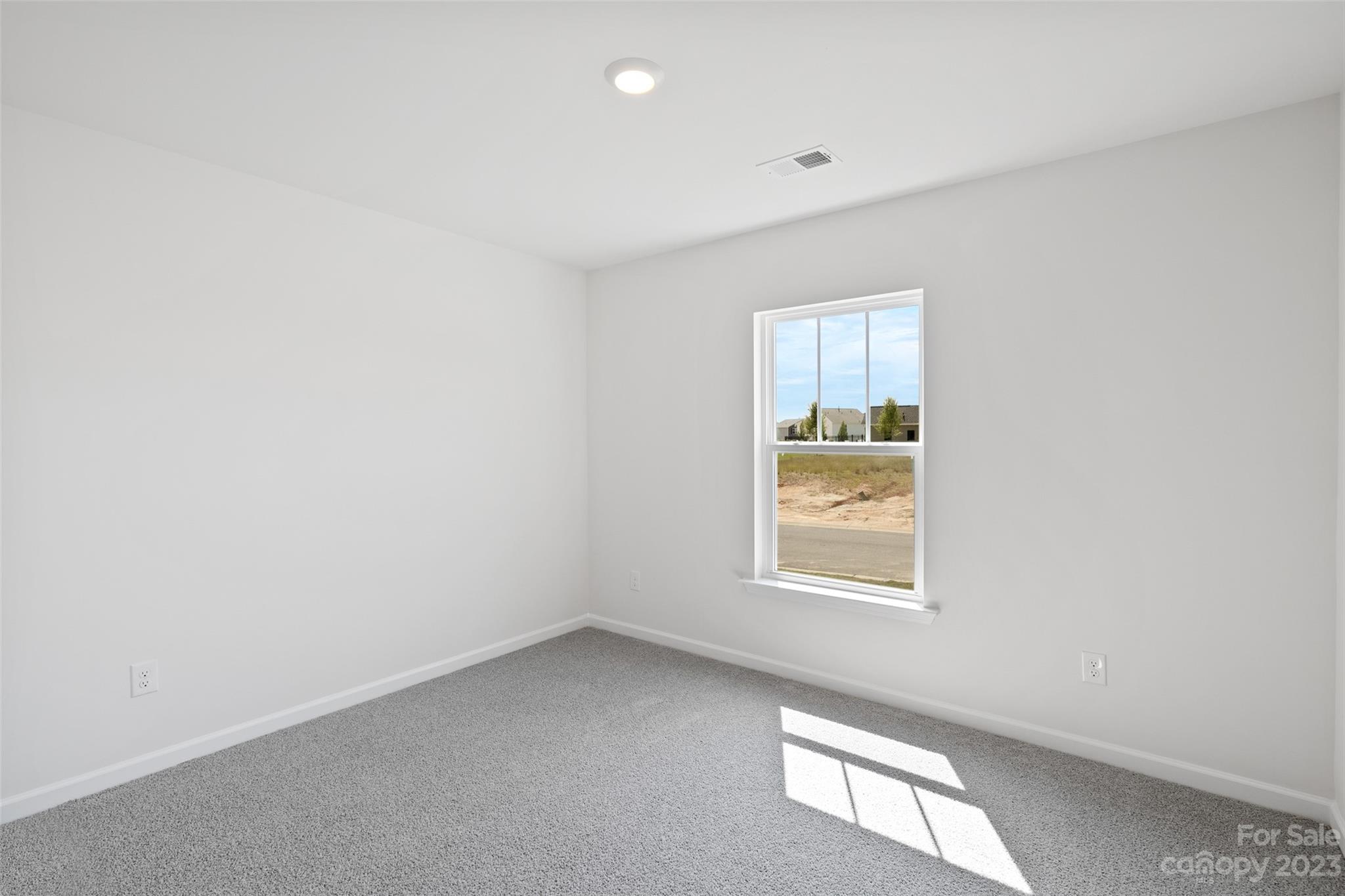 36 Burdock Road Fletcher, NC 28732 - Photo 4 of 18 an empty room with a window