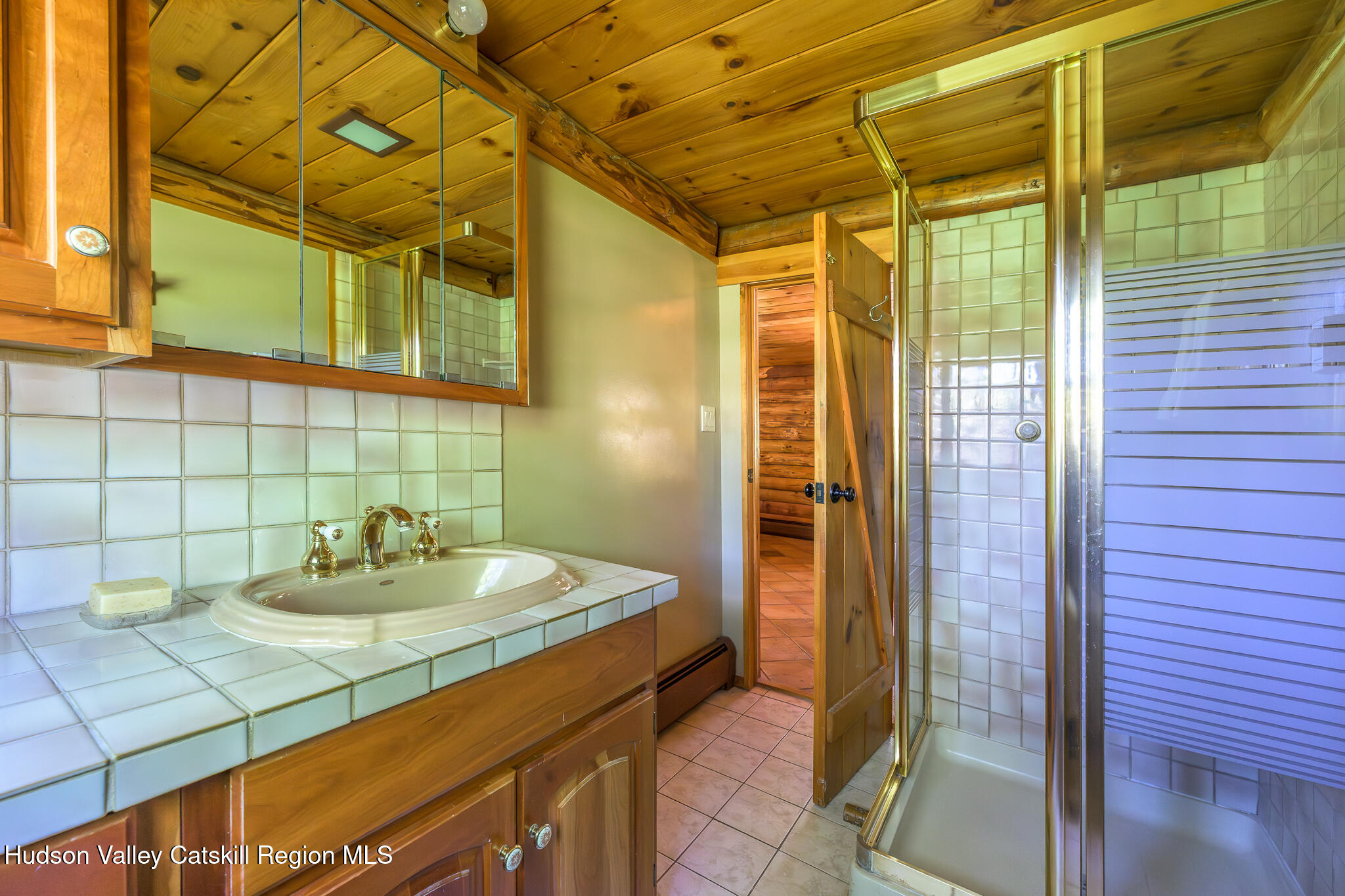 34 Queechy Shore Beach Road Canaan, NY 12029 - Photo 14 of 31 a bathroom with a sink and a mirror