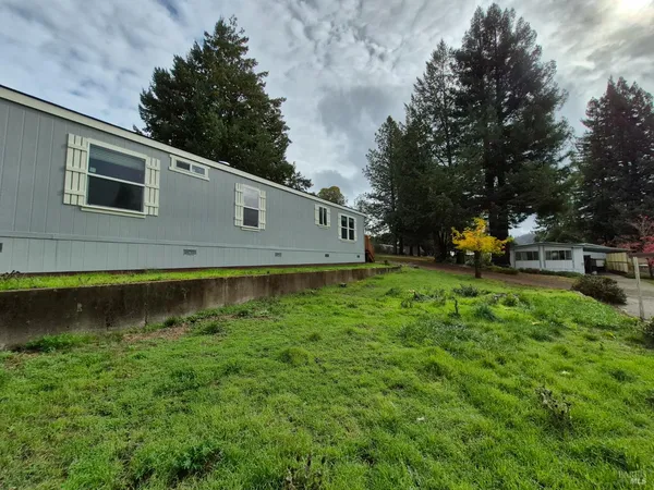 a view of a back yard of the house