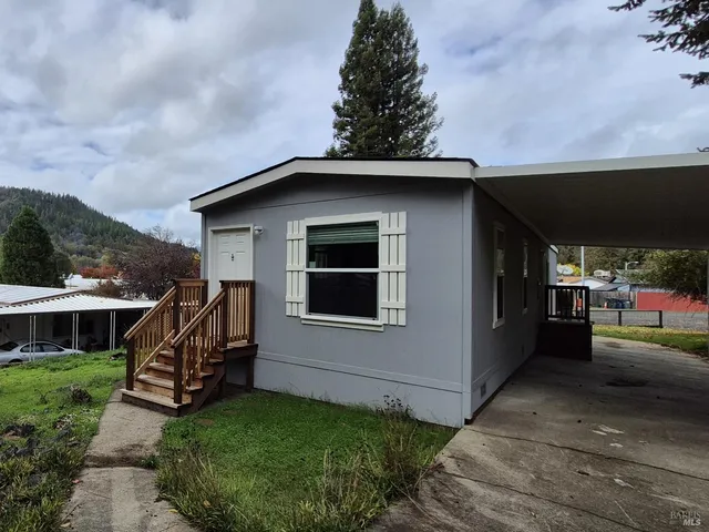 a view of a house with a patio
