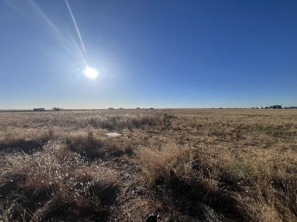 an aerial view of residential space with parking space